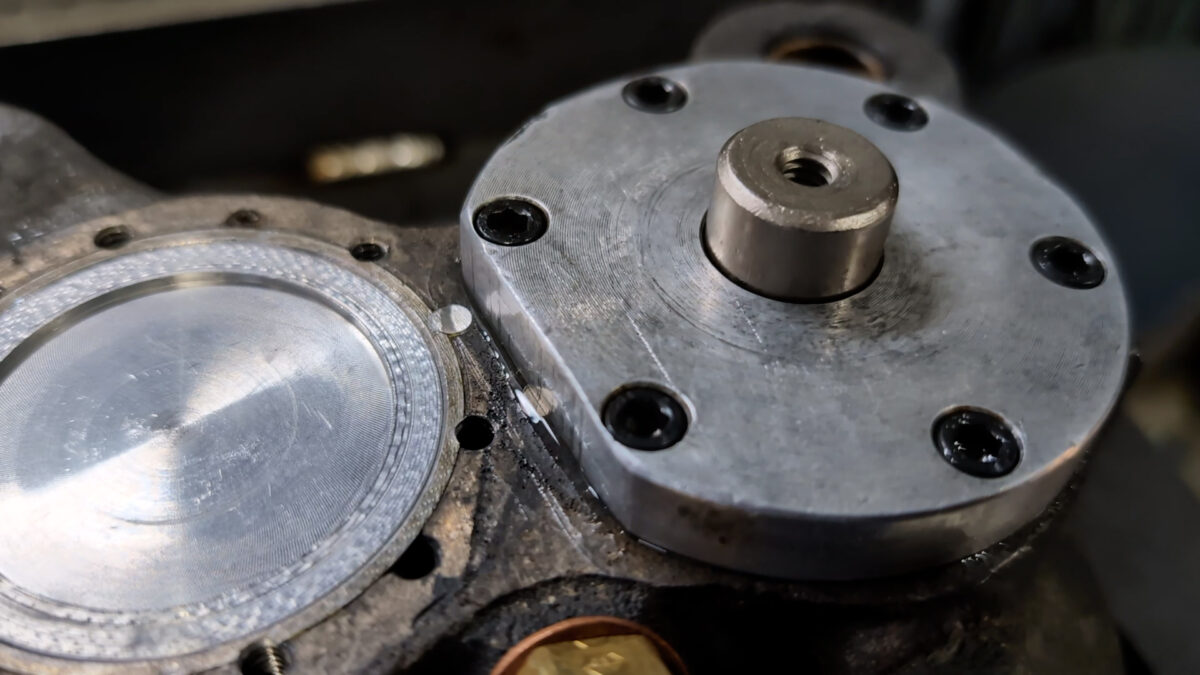 Photo of the back of a Halibrand caliper with signs of fluid leaks