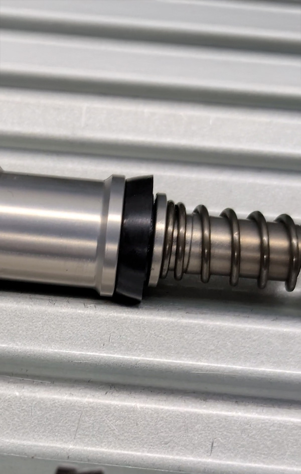 Photo of the Wilwood 260-8556-BK master cylinder's non-fluted primary seal.