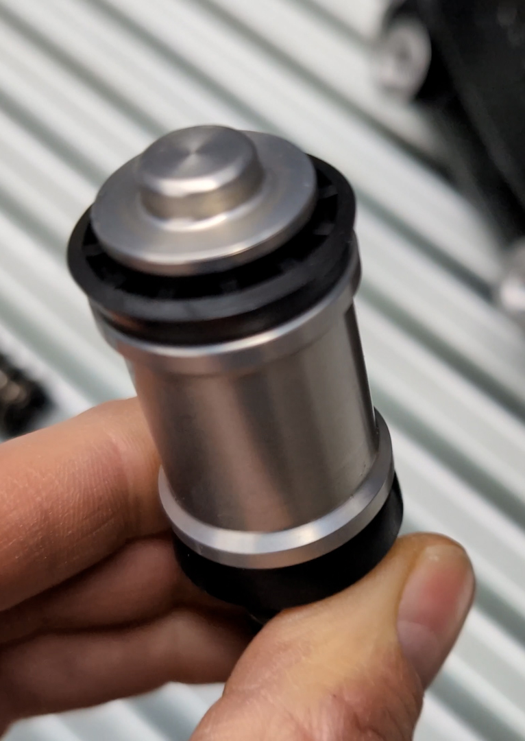 Photo of the Wilwood 260-8556-BK master cylinders piston with no recuperation holes